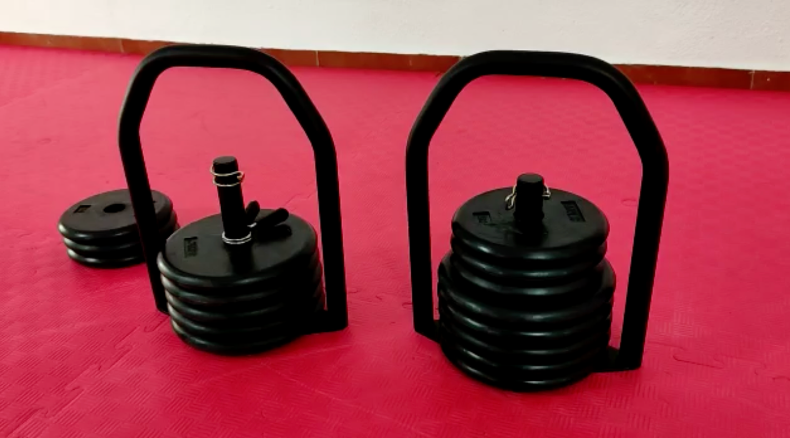 Regulabell adjustable kettlebells at different weight configurations